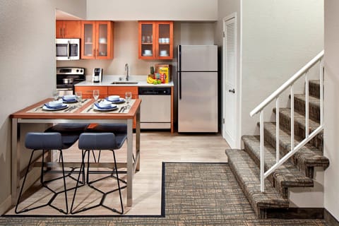 Suite, 1 Bedroom (Second Bed in Loft) | Private kitchen | Full-size fridge, microwave, stovetop, dishwasher