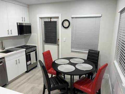 Signature Apartment | Private kitchen | Full-size fridge, microwave, oven, stovetop