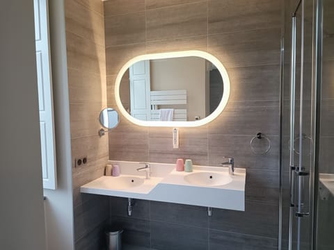 Superior Suite | Bathroom | Hair dryer, towels