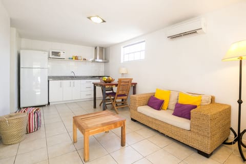 Standard, 1 Bedroom Apartment | Living area | Flat-screen TV