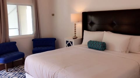 Standard Room, 1 King Bed | Pillowtop beds, individually decorated, individually furnished