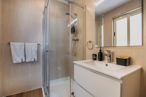 Superior Room | Bathroom | Shower, hair dryer, towels, soap