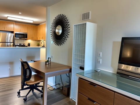 Apartment, 1 Bedroom | Living area | 55-inch TV with cable channels, Netflix, streaming services