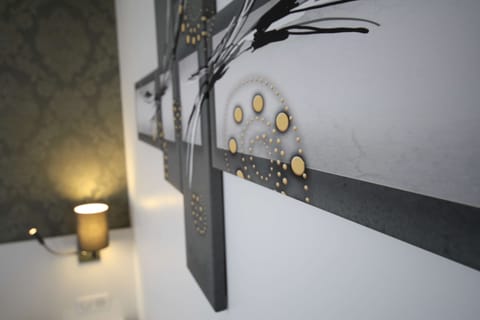 Desk, iron/ironing board, free cribs/infant beds, free WiFi