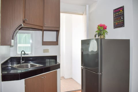 Family Room | Private kitchenette | Fridge