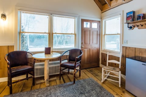 Cabin (Tiny, Offsite) | Desk, blackout drapes, iron/ironing board, free cribs/infant beds