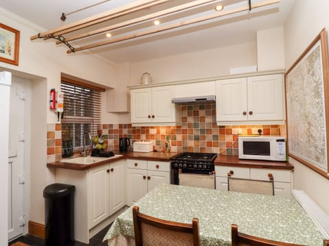 Fridge, electric kettle, toaster, cookware/dishes/utensils