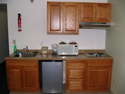 Fridge, microwave, stovetop, coffee/tea maker