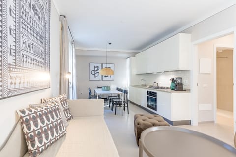 Family Apartment, 2 Bedrooms, 2 Bathrooms, Lakeside (Porto Letizia Viola 1) | Private kitchen | Fridge, stovetop, dishwasher, coffee/tea maker