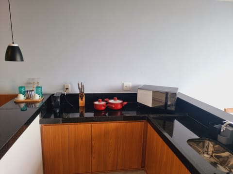 Deluxe Apartment, 1 Queen Bed, Kitchenette, Sea View | Private kitchen | Espresso maker