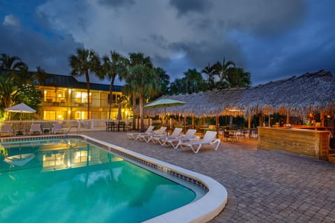 Outdoor pool, pool umbrellas, sun loungers