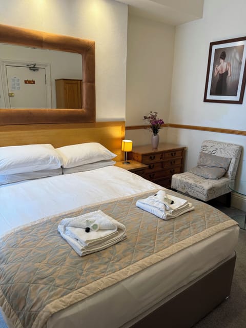 Standard Room | Blackout drapes, iron/ironing board, free WiFi