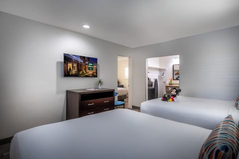 Standard Suite, 2 Bedrooms | Desk, laptop workspace, iron/ironing board, cribs/infant beds