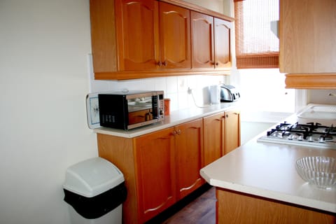 Family Apartment, 2 Bedrooms, Kitchen | Private kitchen | Fridge, coffee/tea maker, electric kettle