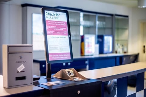 Check-in/check-out kiosk