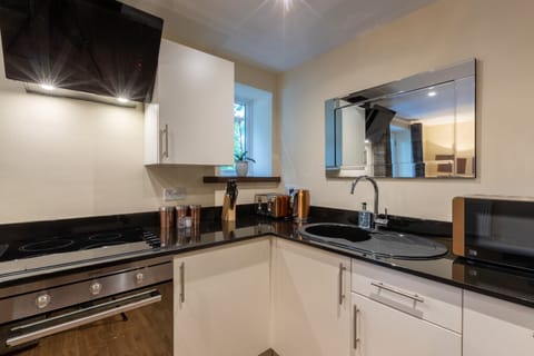 Two Bedroom First Floor Apartment on Two Levels | Private kitchen | Coffee/tea maker, electric kettle