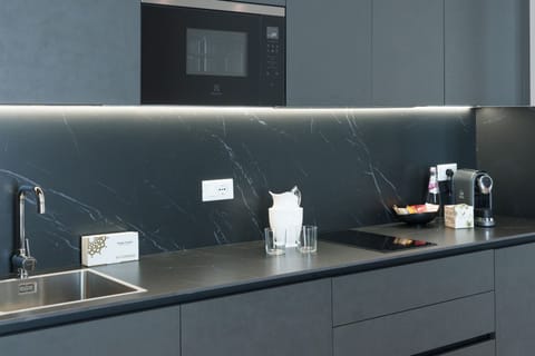 Suite Deluxe Balcony (2-bedroom) | Private kitchen | Fridge, microwave, stovetop, dishwasher