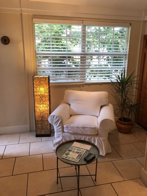 Deluxe Room, 1 King Bed | Living area | Flat-screen TV