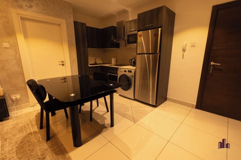 Executive Apartment, 2 Bedrooms, Pool View | Private kitchen | Full-size fridge, microwave, oven, stovetop