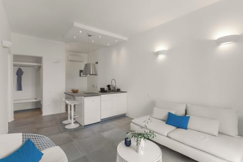 Deluxe Apartment | Living area | 43-inch Smart TV with satellite channels, TV