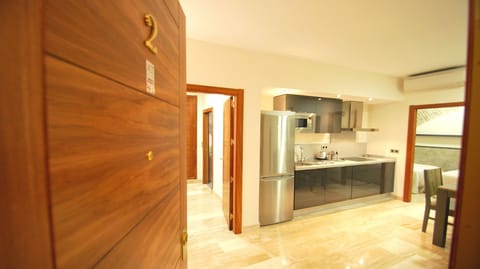 Apartment, 1 Bedroom | Private kitchen | Full-size fridge, microwave, stovetop, dishwasher