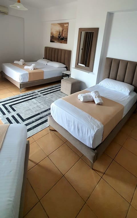 Family Quadruple Room, 1 Bedroom, Sea View | Free WiFi, bed sheets