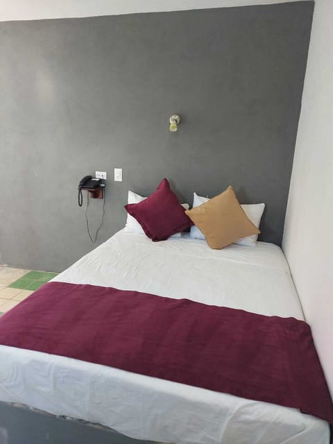 Standard Room, 1 Queen Bed | Blackout drapes, iron/ironing board, free WiFi, bed sheets