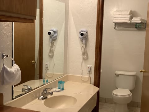 Standard Room, 2 Queen Beds, Non Smoking | Bathroom | Combined shower/tub, hair dryer, towels