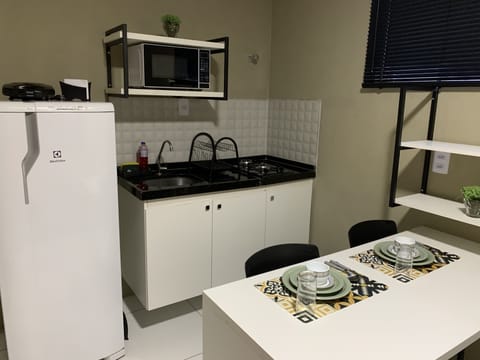 Deluxe Double Room, 1 Double Bed | Private kitchen | Full-size fridge, microwave, stovetop, cookware/dishes/utensils