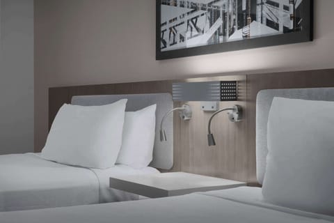 Desk, laptop workspace, blackout drapes, iron/ironing board