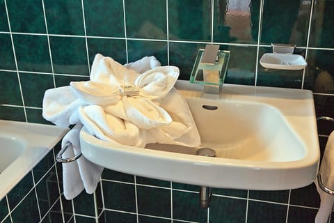 Deep soaking tub, rainfall showerhead, free toiletries, hair dryer