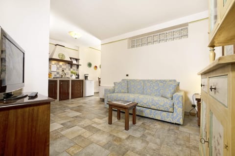 Apartment, 1 Bedroom | Living area | 40-cm LCD TV with digital channels, TV