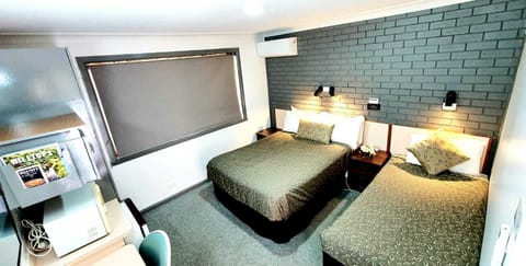 Premium bedding, desk, laptop workspace, soundproofing