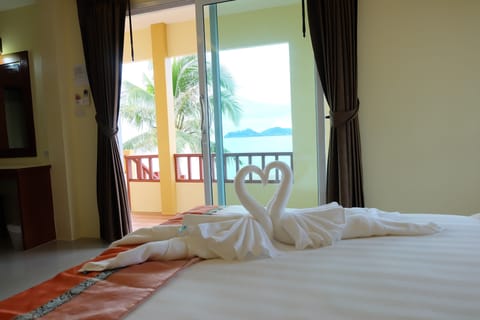 Quadruple Room, Non Smoking, Beachfront | In-room safe, free WiFi, bed sheets