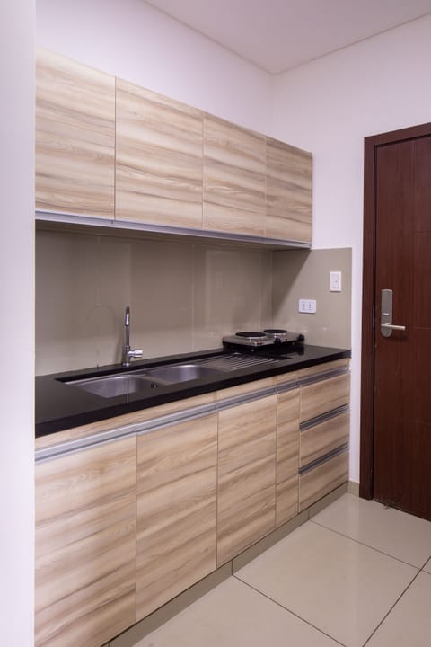 Deluxe Suite, 1 Bedroom | Private kitchen | Mini-fridge, microwave, dishwasher, toaster