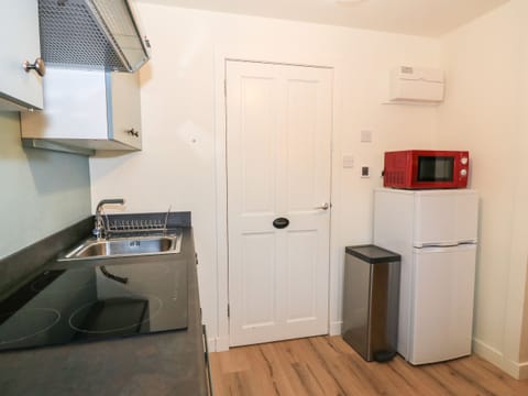 Fridge, electric kettle, toaster, cookware/dishes/utensils