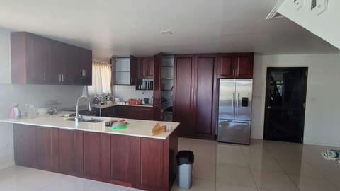 Deluxe Apartment, 4 Bedrooms | Private kitchen | Microwave, oven, dishwasher, rice cooker