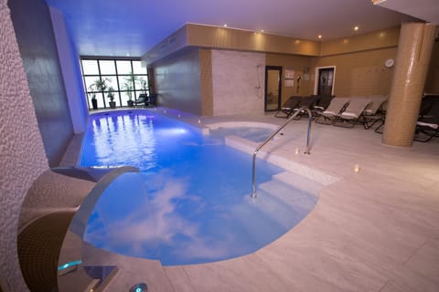 Indoor pool, seasonal outdoor pool, sun loungers