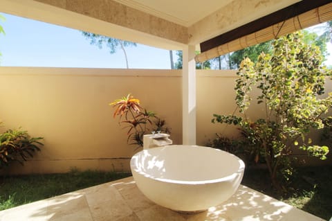 Family Villa | Bathroom | Separate tub and shower, rainfall showerhead, bathrobes, bidet