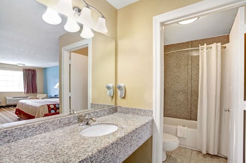 Combined shower/tub, deep soaking tub, free toiletries, hair dryer