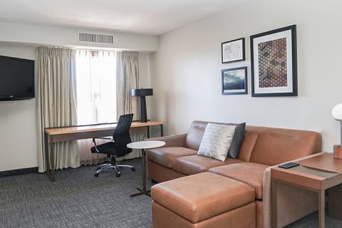 Suite, 1 Bedroom | Living area | 37-inch Smart TV with cable channels, TV