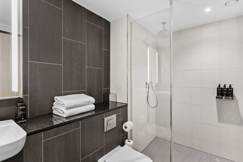 Shower, eco-friendly toiletries, hair dryer, towels