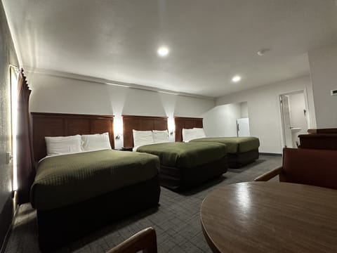 Deluxe Triple Room, Non Smoking, Kitchenette | Premium bedding, individually furnished, free WiFi, bed sheets