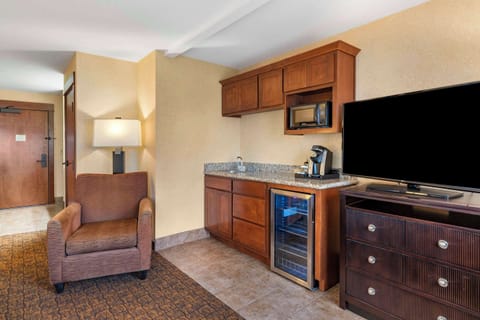 Standard Room, 2 Queen Beds, Non Smoking (Larger Room Wet Bar) | Desk, laptop workspace, blackout drapes, iron/ironing board