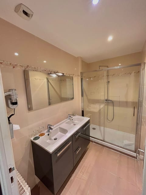 Comfort Twin Room | Bathroom | Designer toiletries, hair dryer, towels, soap