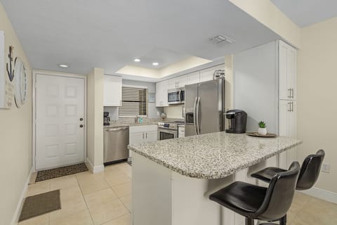 Condo, 2 Bedrooms | Private kitchen | Fridge, oven, coffee/tea maker