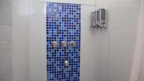 Standard Double Room | Bathroom | Shower, towels, soap, shampoo