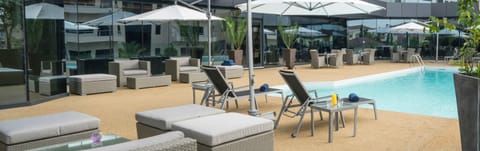 Outdoor pool, pool umbrellas, sun loungers