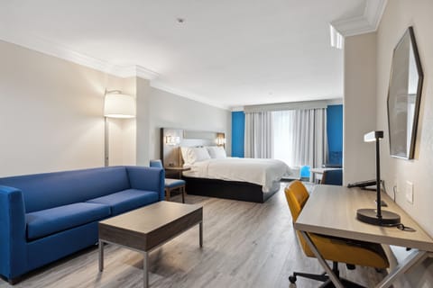 Suite, 1 King Bed | Pillowtop beds, in-room safe, desk, laptop workspace