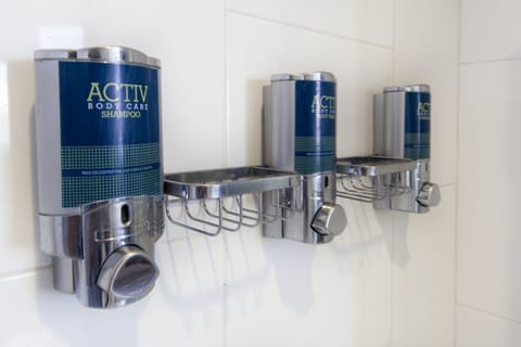 Classic Room | Bathroom amenities | Hair dryer, towels, soap, shampoo